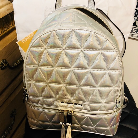 Silver Micheal Kors backpack. - Picture 3 of 5